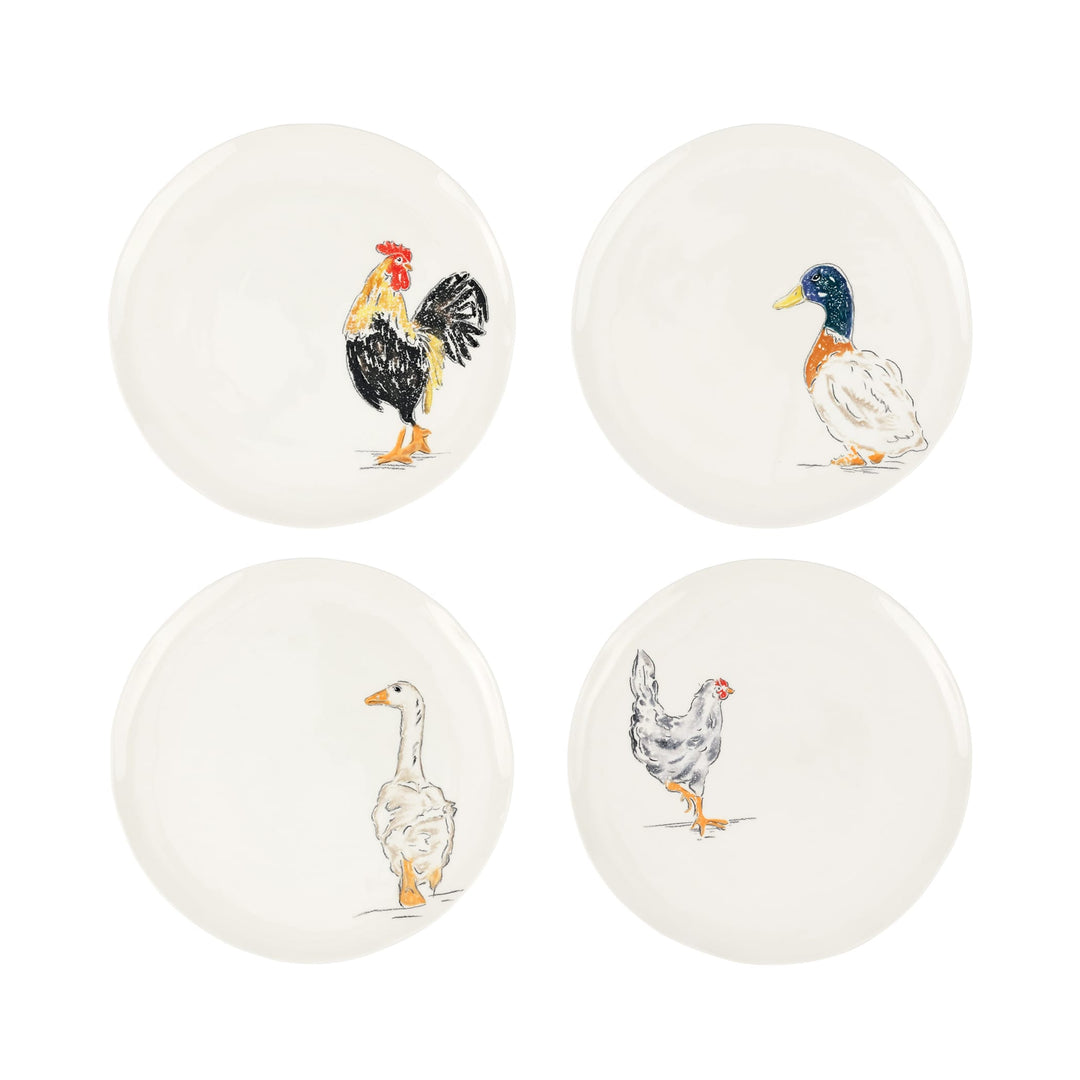 Set of four ceramic plates with animal illustrations on a white background