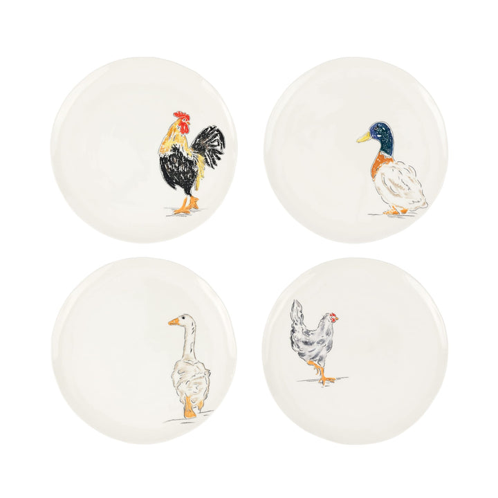 Set of four ceramic plates with animal illustrations on a white background