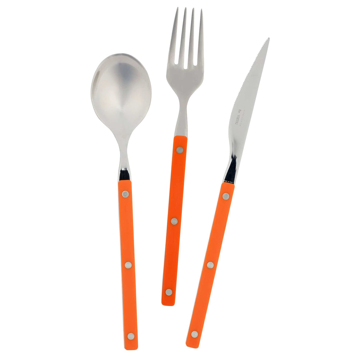 Set of cutlery with orange handles on a white background